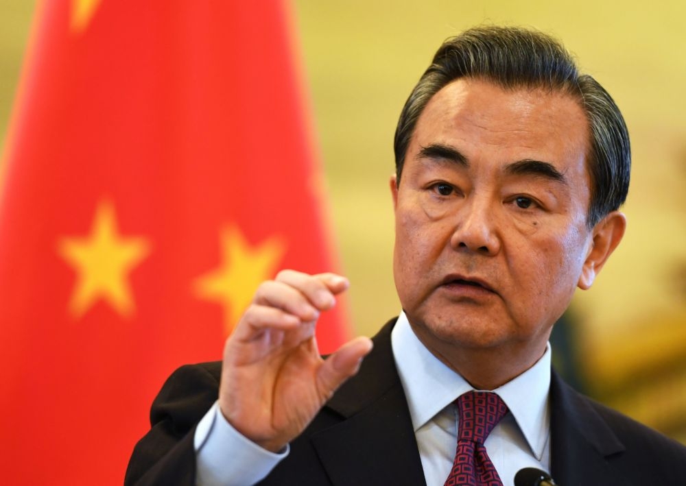 中國外交部長王毅12日批評川普不願被一中原則限制的言論。（湯森路透）
