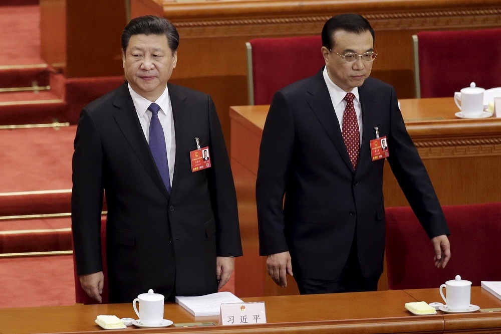 中國年度政治盛事「兩大」即將開幕，有關涉台部分，外界預料國務總理李克強（右）將維持一年來基調，習近平（左）則可能對就台方針做出新的表態。（湯森路透）