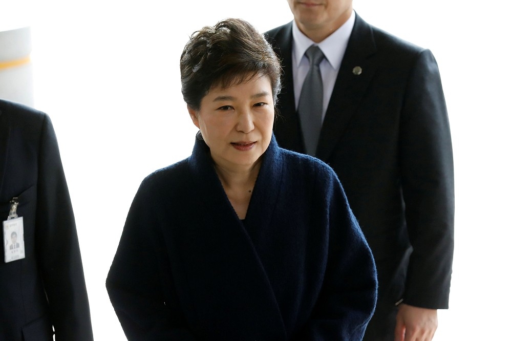 南韓總統朴槿惠21日上午前往南韓調查廳接受調查。（湯森路透）