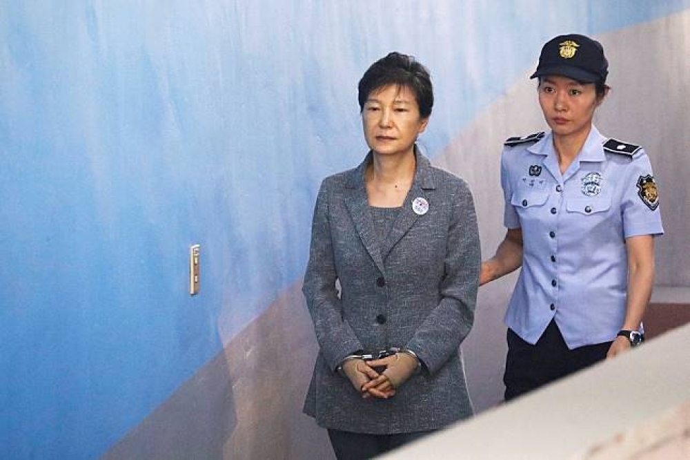 南韓前總統朴槿惠任內爆發親信干政醜聞，成為南韓第一位遭彈劾下台的國家元首。（湯森路透）