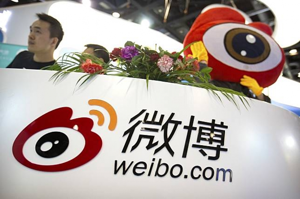 中國網路監管趨嚴，要求微博設立「網路實名制」。（美聯社）