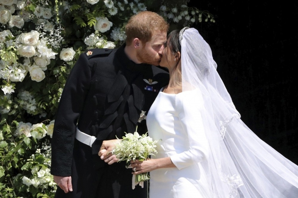 哈利王子與梅根19日舉行婚禮，吸引眾多媒體爭相轉播。（美聯社）