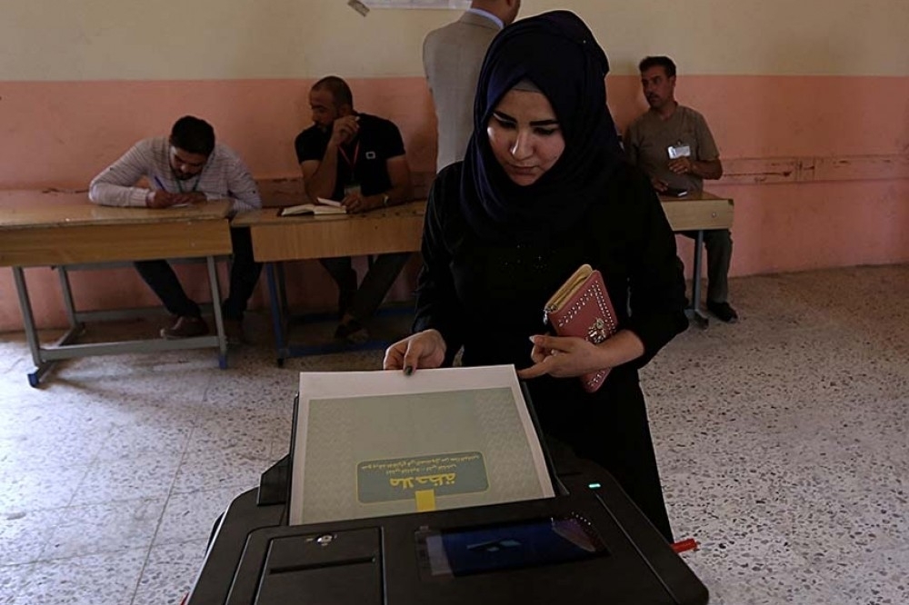 伊拉克12日舉行自打敗伊斯蘭國後首場選舉。（美聯社）