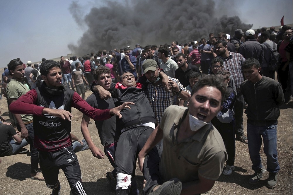 以色列、巴勒斯坦邊境爆發大規模示威抗議，許多巴勒斯坦人傷亡。（美聯社）