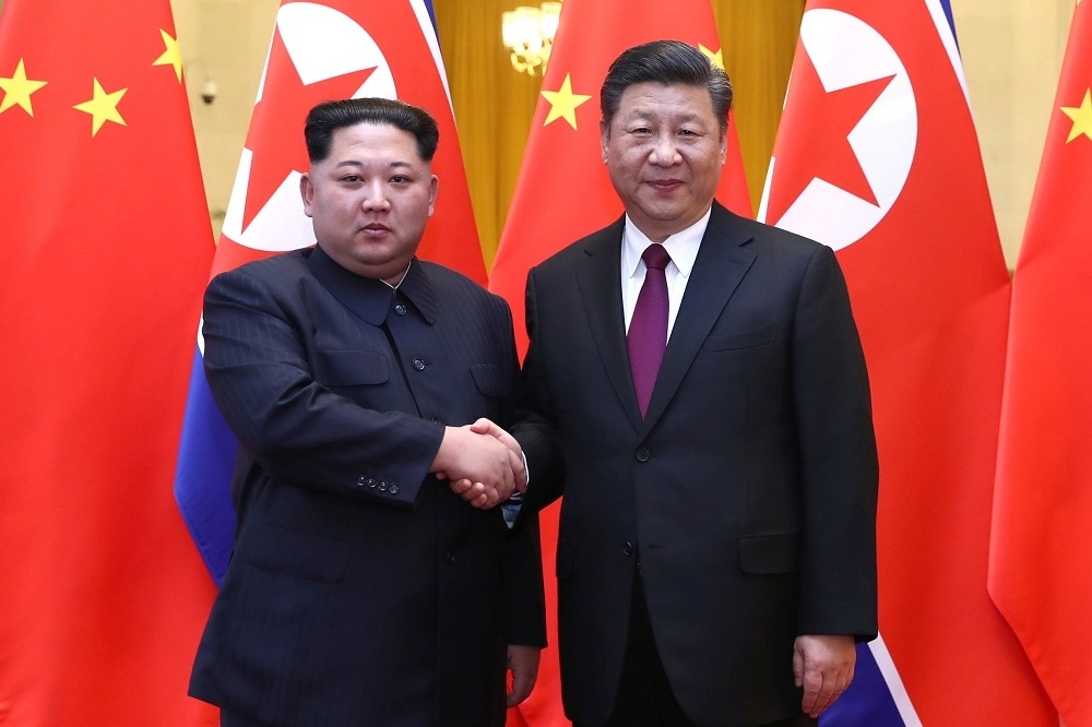 北韓領導人金正恩26日與中國國家主席習近平在北京會面。（湯森路透）