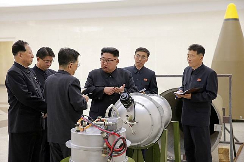 北韓豐溪里核試驗場近日的衛星照片顯示，3月中旬起已停止核試爆。（湯森路透）