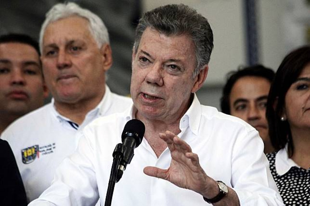 哥倫比亞總統桑托斯（Juan Manuel Santos）宣布加強哥、委兩國的邊境管制，以防委國人持續湧入。（湯森路透）