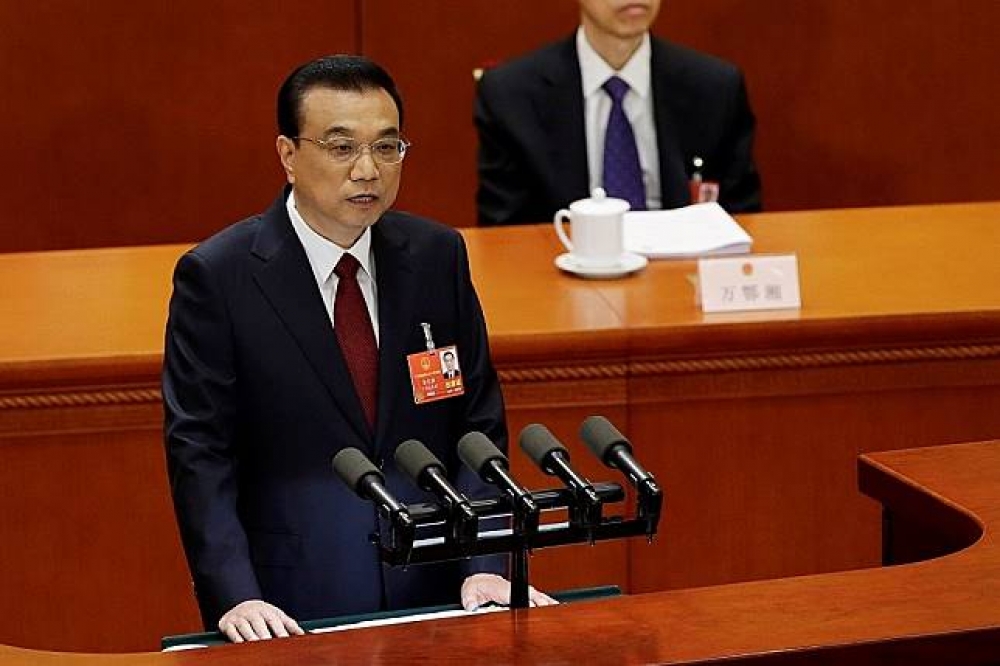 李克強18日順利連任中國國務院總理。（湯森路透）