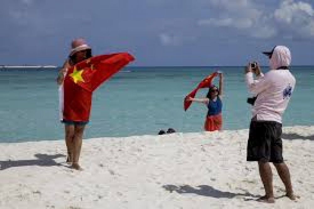 中國官方將允許外籍人士在海南的外國遊客集聚區自由上網，但對本國網民依舊嚴加封鎖。（美聯社）