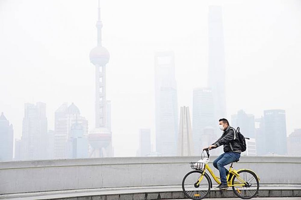 解決氣候變遷，中國推出自己的碳交易計畫，交易所將設在上海市。（湯森路透）