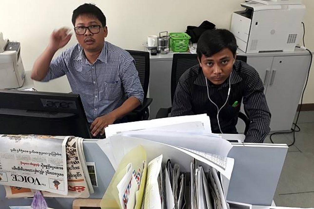 2名路透社記者瓦隆（左）及吳覺梭（右）日前遭緬甸政府以「政府機密法」拘留起訴。（湯森路透）