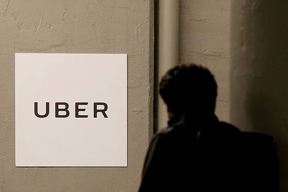 Uber疑似透過漏洞懸賞計畫，支付10萬美元給20歲的駭客。（湯森路透）