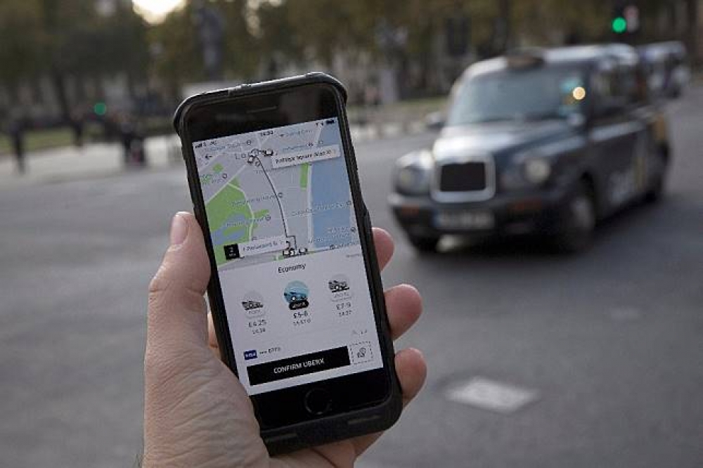 乘車媒合平台「優步」（Uber）9日遭英國勞資審裁法庭裁定，Uber司機屬受雇員工，應給付最低薪資。（湯森路透）
