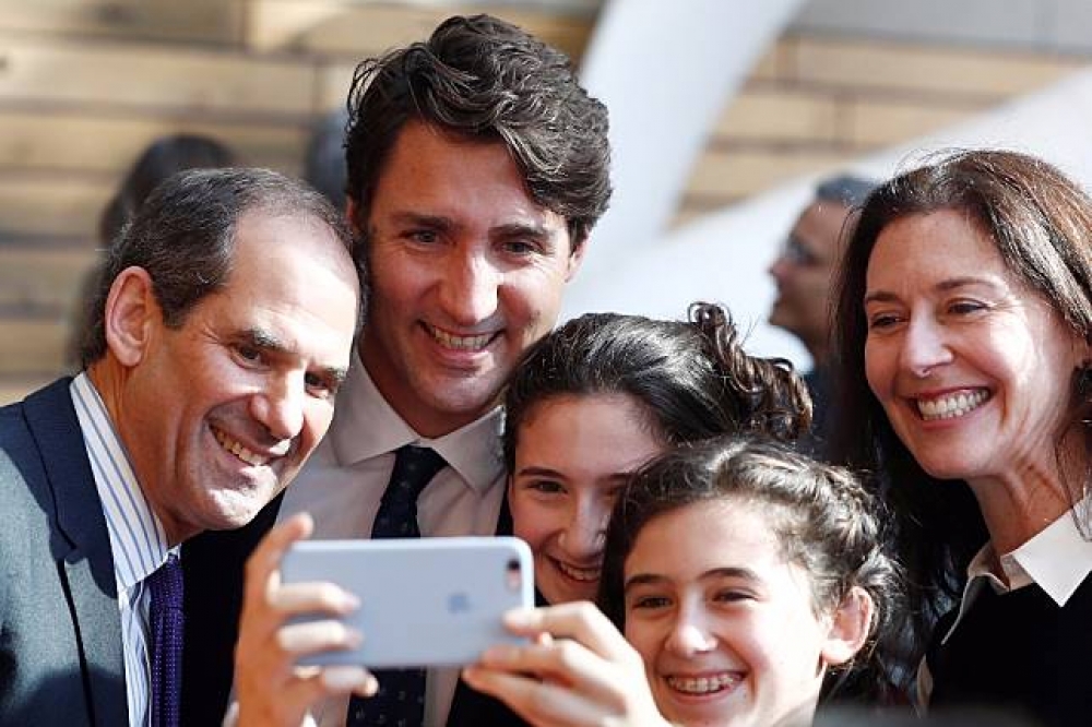 據報導，加拿大的公民組成中每5個就有一位移民。左二為加拿大總理杜魯道（Justin Trudeau）（湯森路透）