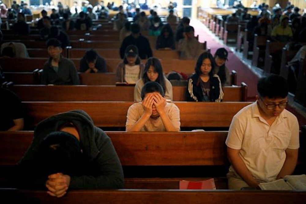 南韓長老會神學大學的學生進行晨禱。（湯森路透）