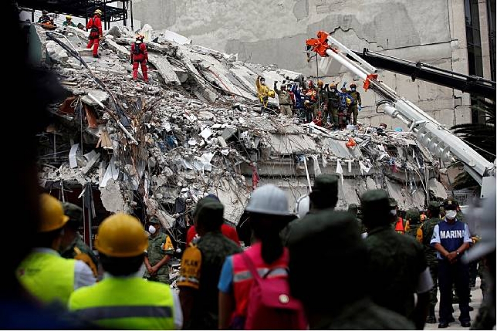 墨西哥大地震中，受困的5名台僑中確認林家慶、王家妤及金珮如已不幸罹難。（湯森路透）