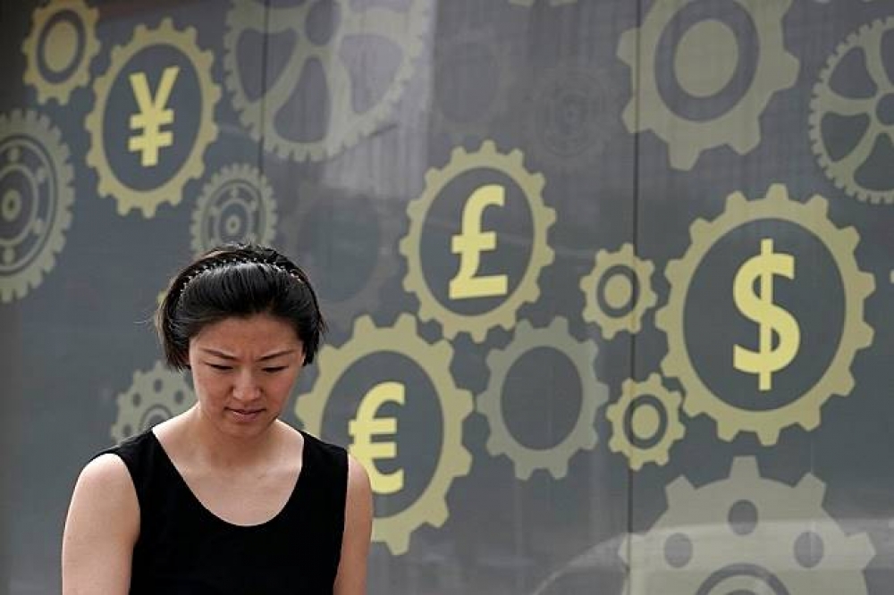 4日中國央行宣布禁止ICO融資。（湯森路透）
