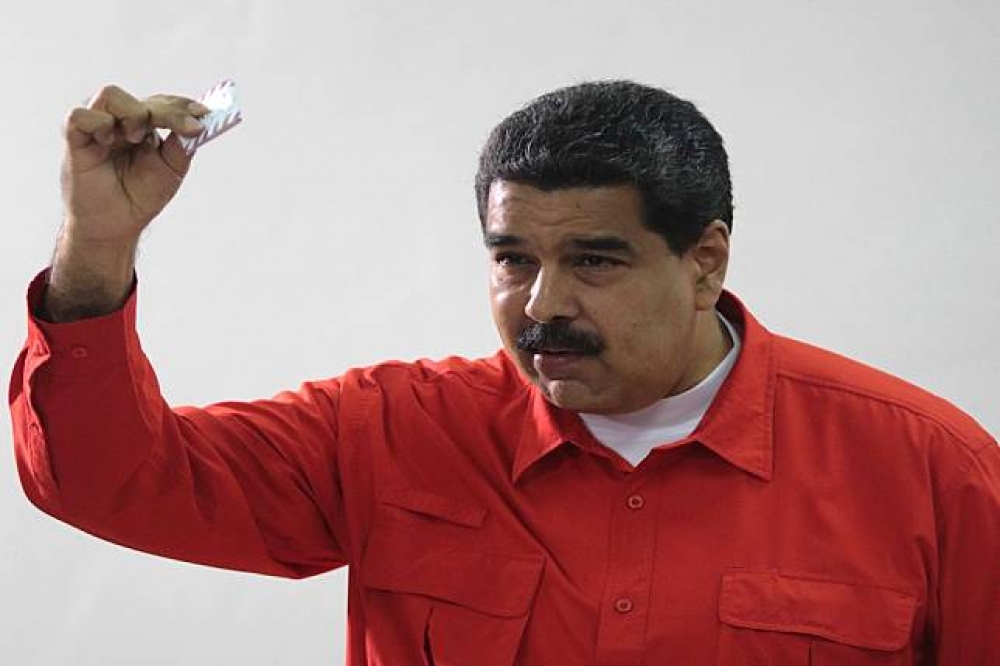 30日，委內瑞拉總統馬杜洛（Nicolas Maduro）前往投票所，為制憲大會選舉投票。（路透社）