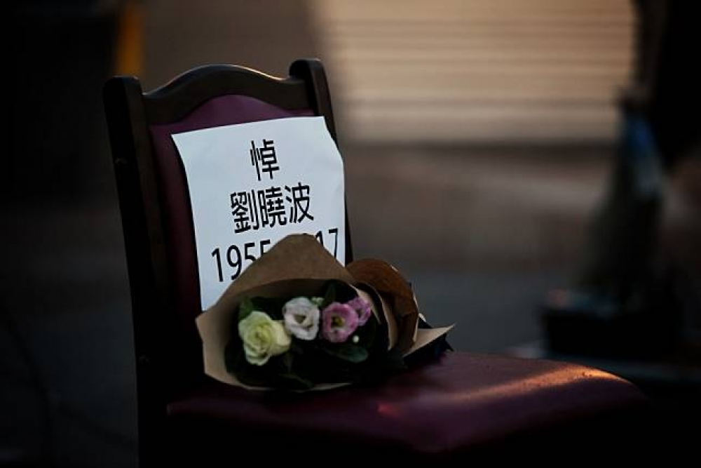 人權鬥士劉曉波13日逝世，華人民主書院於14日下午6點半在自由廣場舉行「劉曉波追思會」。（攝影：李昆翰）