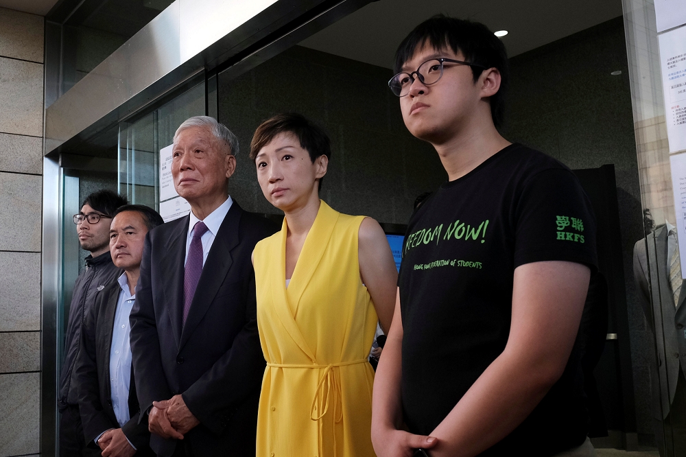張秀賢（右一）在佔中九子裡年紀最輕，為香港中文大學前學生會會長。（湯森路透）