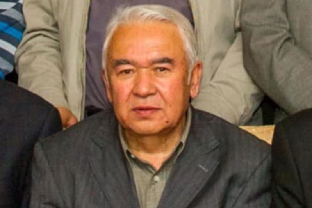 土赫提（中）在中國新疆首府烏魯木齊參加學術會議。（美國之音引用自Abduweli Ayup）