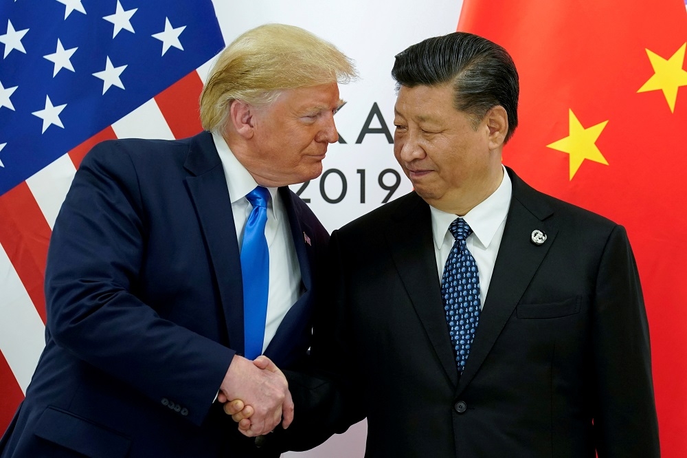 2019年，美國總統川普（左）、中國國家主席習近平出席日本G20峰會。（湯森路透）