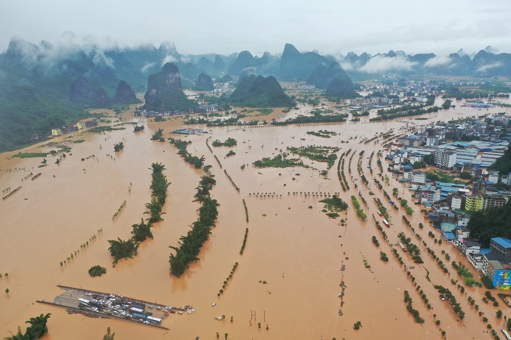 中國廣西壯族自治區洪災氾濫。（湯森路透）