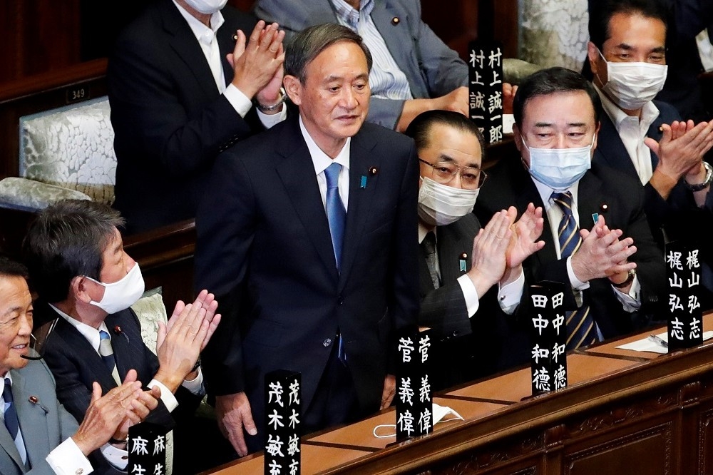 菅義偉正式就任日本新首相。（湯森路透）