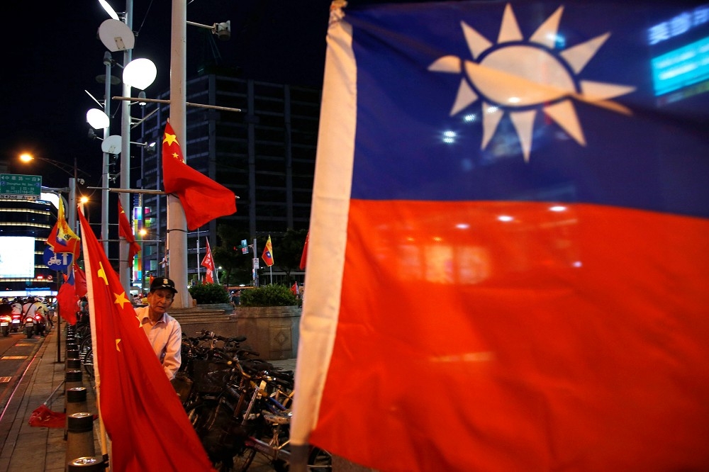 為了避免共產黨不悅，維繫國共兩岸互動，國民黨一直以中華民國台灣去主權化為代價。（湯森路透）