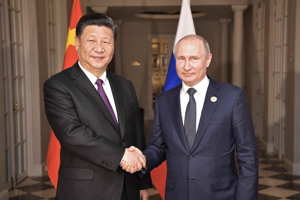 俄羅斯總統普京（右）與中國國家主席習近平。（湯森路透）