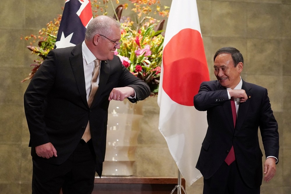 澳洲總理莫里森與日本首相菅義偉。（湯森路透）