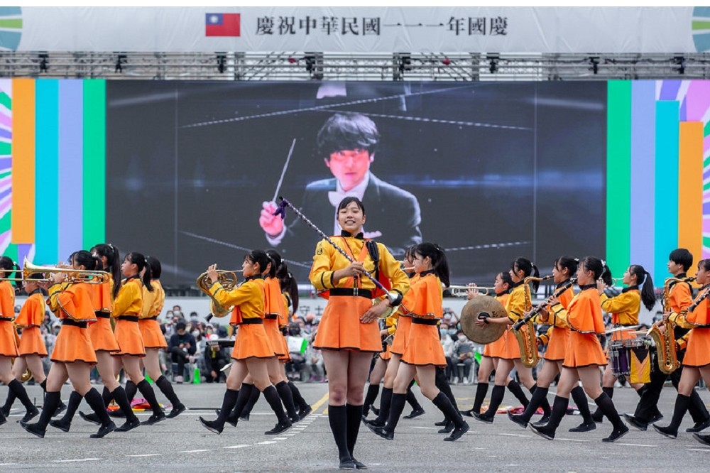 有「橘色惡魔」之稱的日本京都橘高校吹奏部在今年雙十國慶大會引起高度關注。（圖片摘自總統府網站）