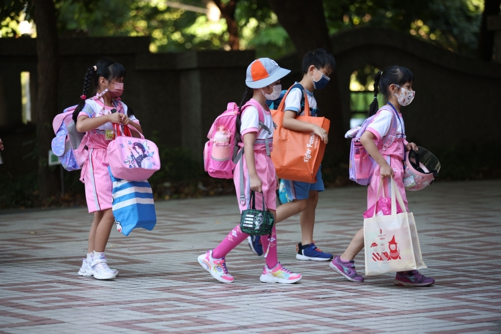 流感疫情升溫，上周國內出現今年首起10歲以下流感死亡案例。示意圖，非當事人。（資料照片／陳愷巨攝）