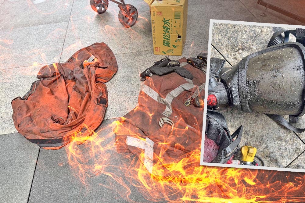 兩名殉職消防員的防火衣、裝備上都沾黏上焦油，研判可能是因此迷航殉職。（翻攝畫面）